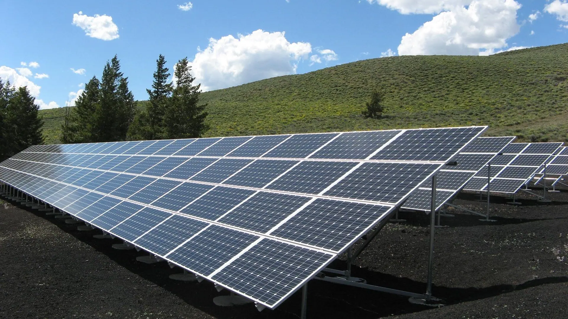 Ground-mounted commercial solar array on open land